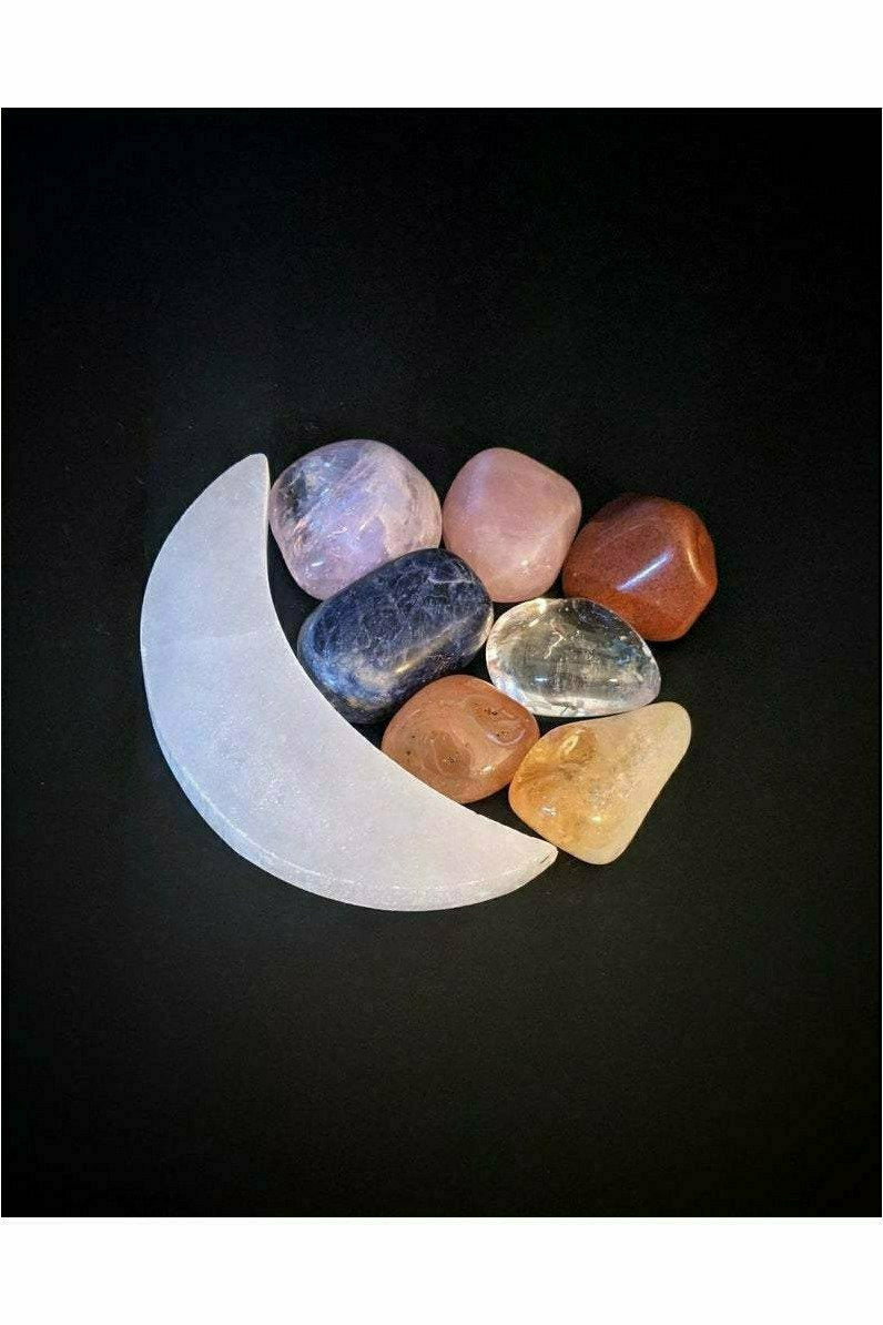 7 crystals set with selenite charging moon