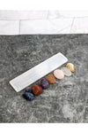 7 tumbled chakra crystals with a selenite charging tray