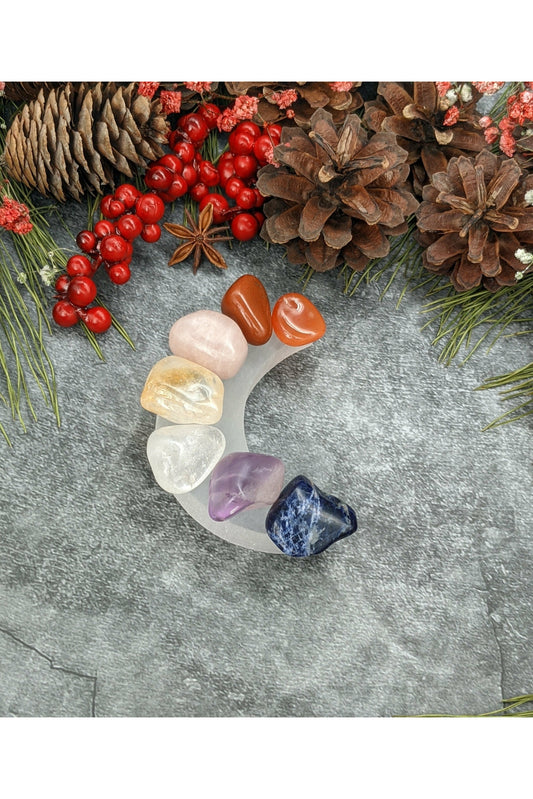 7 crystals set with selenite charging moon