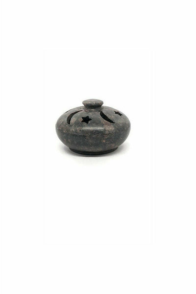 Multi-burner made of soapstone with carved stars and moon pattern