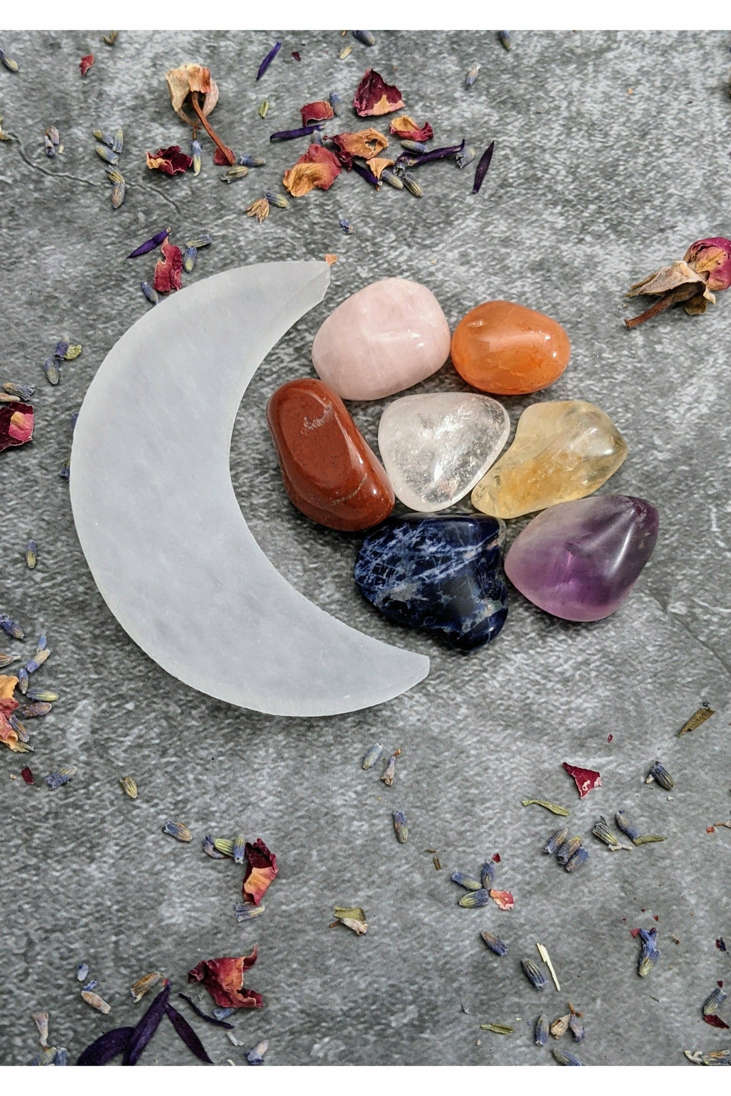 7 crystals set with selenite charging moon