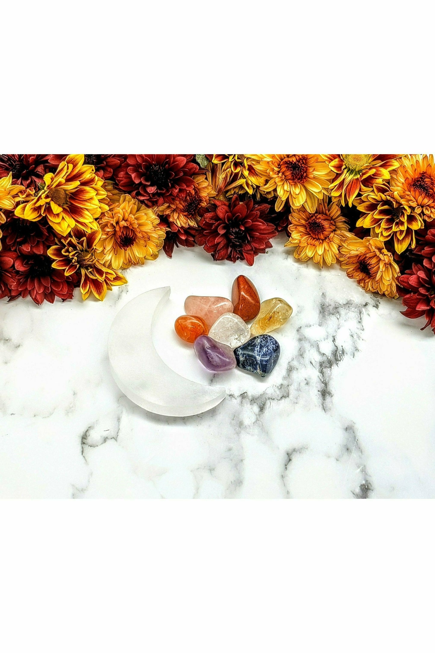 7 crystals set with selenite charging moon