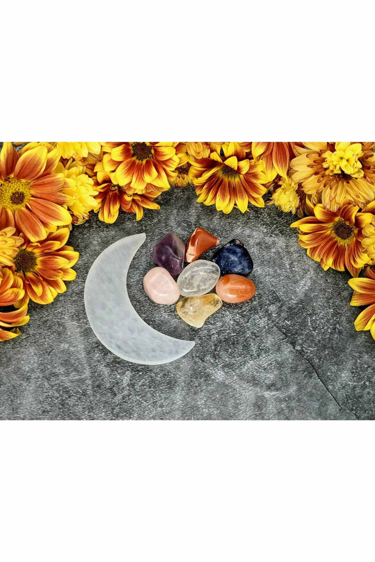 7 crystals set with selenite charging moon