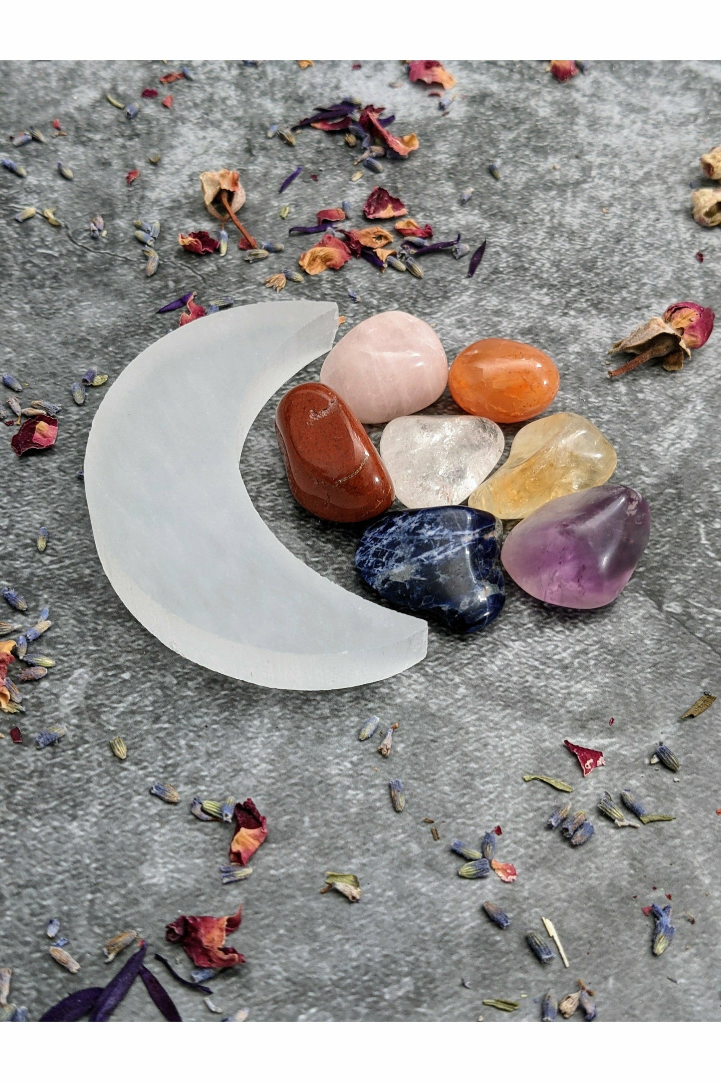 7 crystals set with selenite charging moon