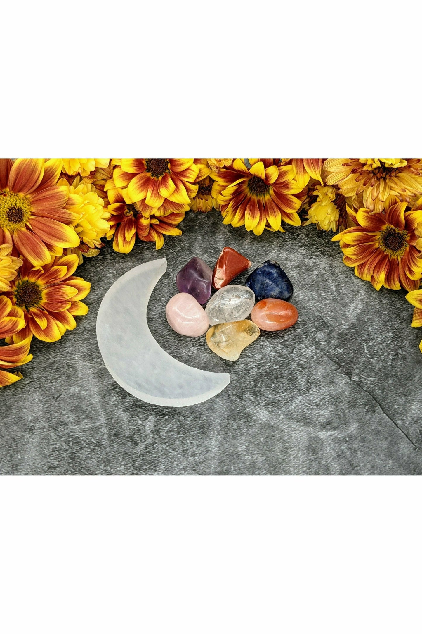 7 crystals set with selenite charging moon